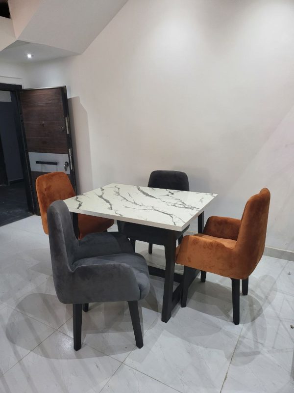 4 seater dining set in a dining room from Winnys Interiors