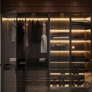 Customizable wardrobes with HDF wood, aluminum profiles, glass, and LED profiles in a bedroom from Winnyz Interiors