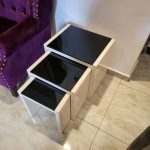 Nest of stools used as side tables in a living room from Winnyz Interiors