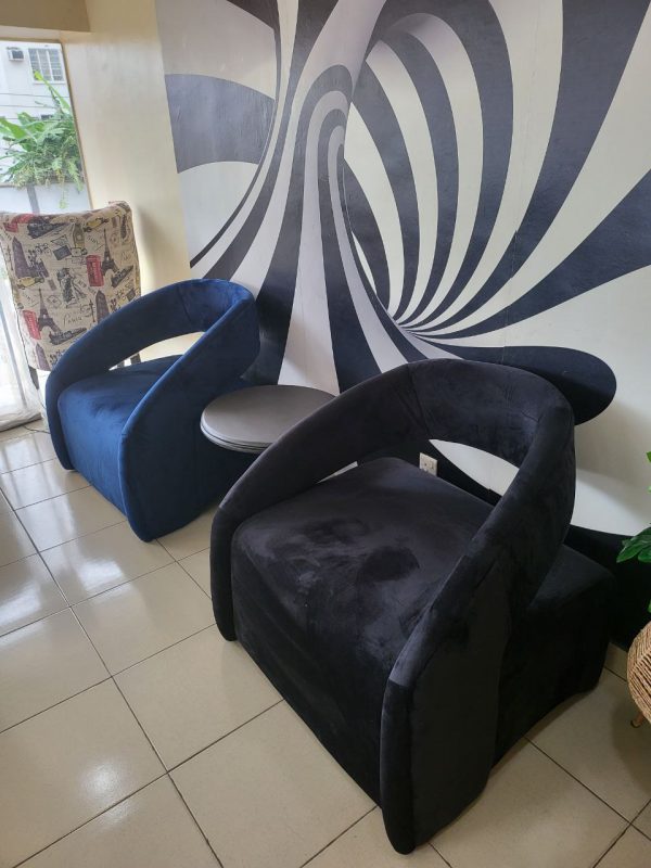 Stylish accent chairs in a living room from Winnyz Interiors